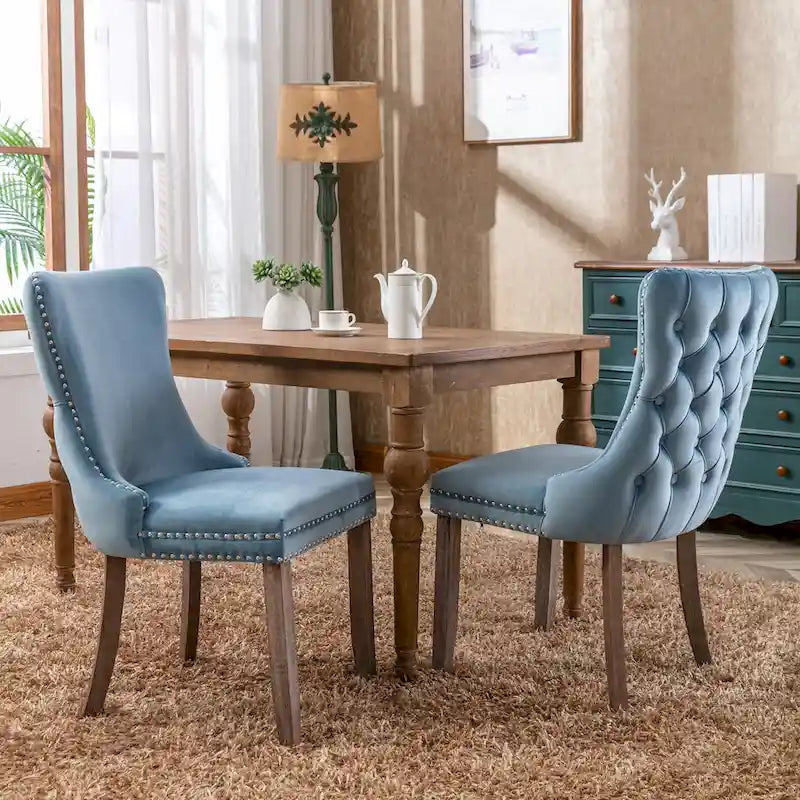 Chaise de salle à manger à dossier cabriolet avec surpiqûres et clous décoratifs